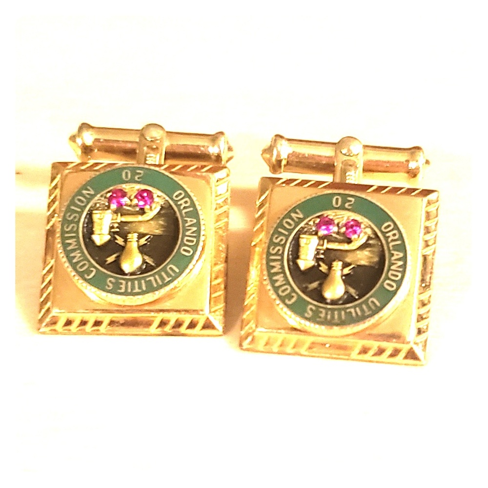 Cufflinks gold over silver with rubies